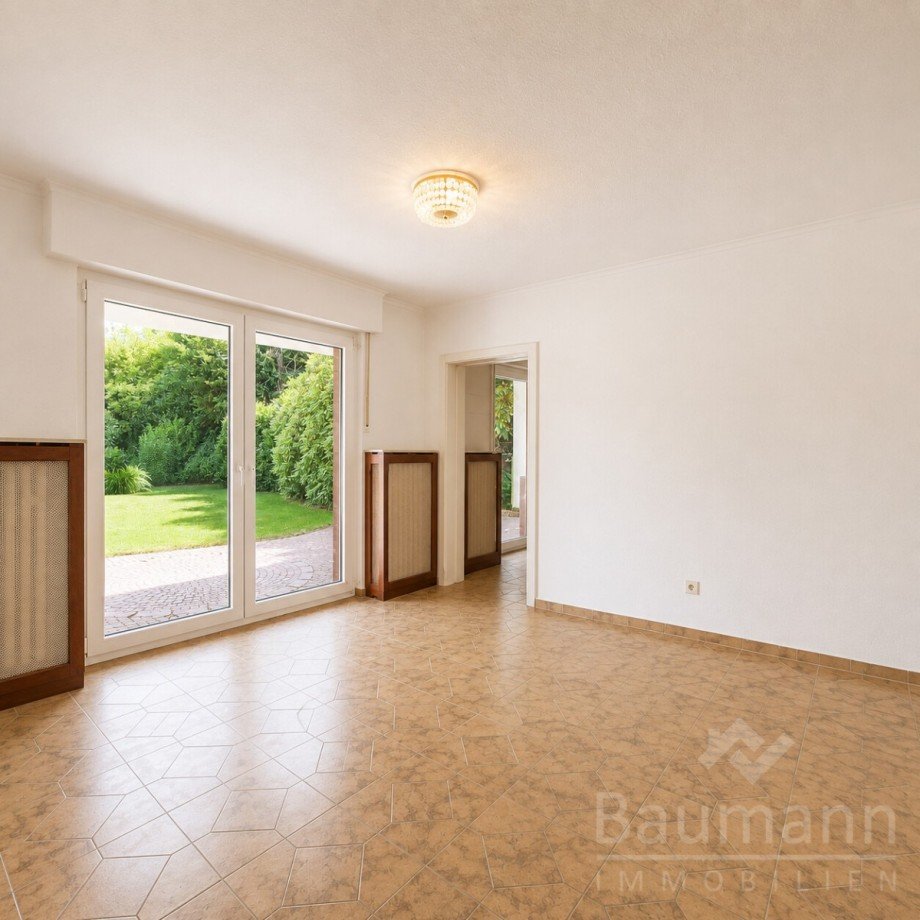 Wohnzimmer Untergeschoss mit Zugang zum Garten Einfamilienhaus Bad H�nningen Einfamilienhaus Bad H�nningen