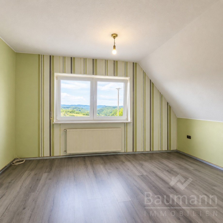 Zweifamilienhaus-Neustadt-Wied-Wohnung-Obergeschoss-Schlafzimmer Einfamilienhaus Neustadt (Wied) / Rotterheide